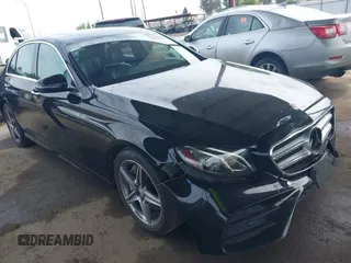 2017 Mercedes-Benz E 300 Luxury z VIN WDDZF4JBXHA036044, wystawiony jako IAAI lot #42053988 z przebiegiem 105 067 mil mil oraz . Historia ofert i sprzedaży dostępna na DreamBid. Obrazek 1.