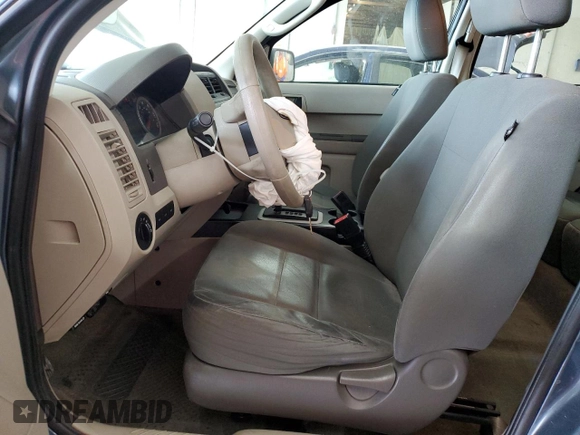 2012 Ford Escape XLS with VIN 1FMCU0C71CKA64501, listed as a Copart auction lot 59606245 with 112,112 mi miles and Salvage title. Bid and sale history available at DreamBid. Image 7.