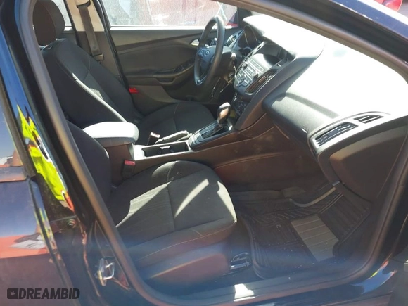 2018 Ford Focus SE with VIN 1FADP3F21JL259271, listed as a IAAI auction lot 41689494 with 94,190 mi miles. Bid and sale history available at carsss.com. Image 5.