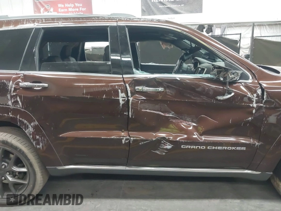 2014 Jeep Grand Cherokee Summit with VIN 1C4RJFJT6EC346575, listed as a IAAI auction lot 41881795 with 148,941 mi miles and . Bid and sale history available at DreamBid. Image 13.