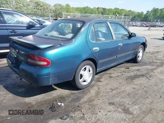 1997 Nissan Altima XE z VIN 1N4BU31D1VC199720, wystawiony jako IAAI lot #42061192 z przebiegiem 312 370 mil mil oraz . Historia ofert i sprzedaży dostępna na DreamBid. Obrazek 4.