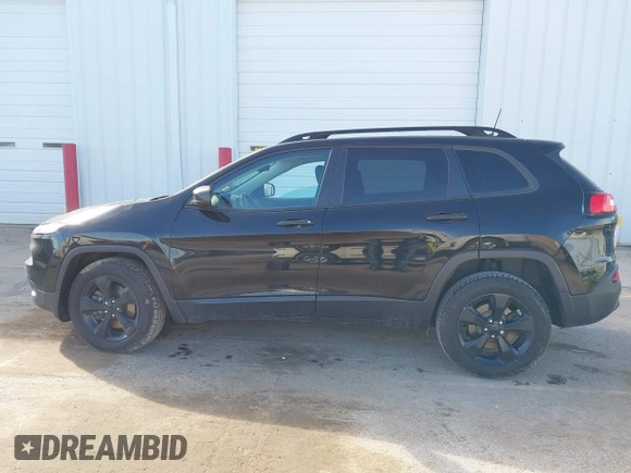 2017 Jeep Cherokee Sport with VIN 1C4PJMAB4HW664474, listed as a IAAI auction lot 41811736 with 102,301 mi miles. Bid and sale history available at carsss.com. Image 14.