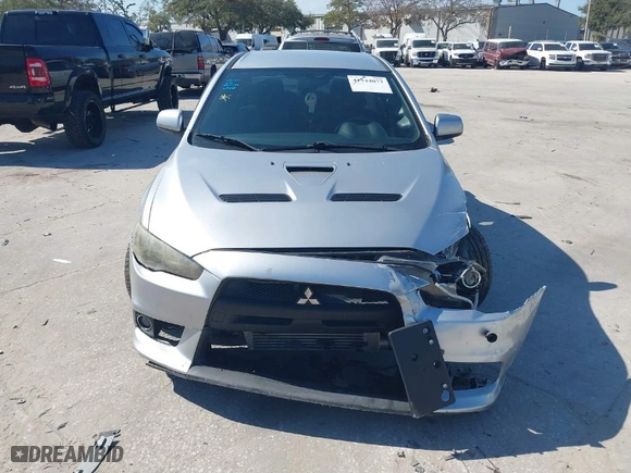 2013 Mitsubishi Lancer Evolution MR with VIN JA32W5FV6DU013470, listed as a IAAI auction lot 41544077 with 124262 miles. Bid and sale history available at carsss.com. Image 12.
