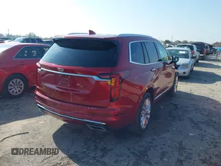 2021 Cadillac XT6 Premium Luxury z VIN 1GYKPCRS1MZ114854, wystawiony jako IAAI lot #41205686 z przebiegiem 27 347 mil mil oraz . Historia ofert i sprzedaży dostępna na DreamBid. Obrazek 4.