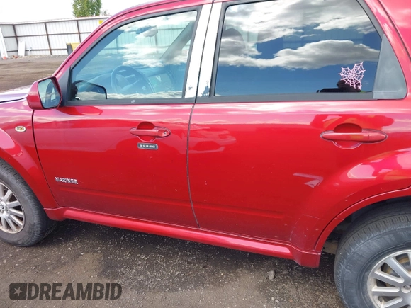 2008 Mercury Mariner Premier with VIN 4M2CU97178KJ00739, listed as a IAAI auction lot 42312408 with 167,591 mi miles and . Bid and sale history available at DreamBid. Image 14.