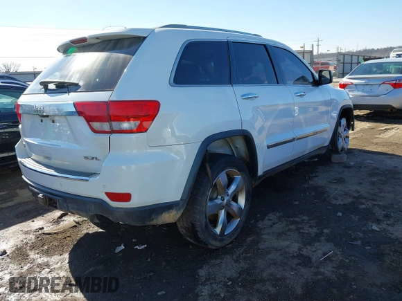 2013 Jeep Grand Cherokee Overland with VIN 1C4RJECT4DC526160, listed as a IAAI auction lot 41429164 with 115,311 mi miles. Bid and sale history available at carsss.com. Image 4.