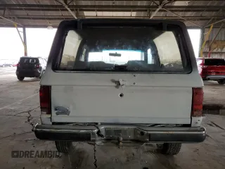 1990 Ford Bronco z VIN 1FMCU14TXLUA68729, wystawiony jako Copart lot #45366995 z przebiegiem 389 150 mil mil oraz Czysty tytuł • Clean title. Historia ofert i sprzedaży dostępna na DreamBid. Obrazek 6.