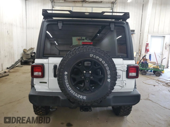 2022 Jeep Wrangler Unlimited Willys with VIN 1C4HJXDM0NW244953, listed as a Copart auction lot 71495154 with 14,577 mi miles and Salvage Title. Bid and sale history available at DreamBid. Image 6.