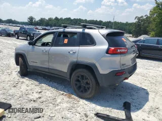 2015 Jeep Cherokee Trailhawk with VIN 1C4PJMBS3FW735398, listed as a Copart auction lot 63700015 with 157,123 mi miles and Clean title. Bid and sale history available at DreamBid. Image 2.