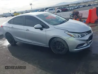 2018 Chevrolet Cruze LS with VIN 1G1BC5SM5J7182051, listed as a IAAI auction lot 41014751 with 112,749 mi miles and . Bid and sale history available at DreamBid. Image 17.