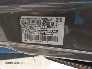 2012 Honda Odyssey Touring with VIN 5FNRL5H93CB109394, listed as a IAAI auction lot 42280018 with 190,412 mi miles and . Bid and sale history available at DreamBid. Image 9.