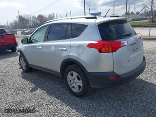 2014 Toyota RAV4 LE with VIN JTMBFREV9ED095397, listed as a IAAI auction lot 41866606 with 100,290 mi miles. Bid and sale history available at carsss.com. Image 3.