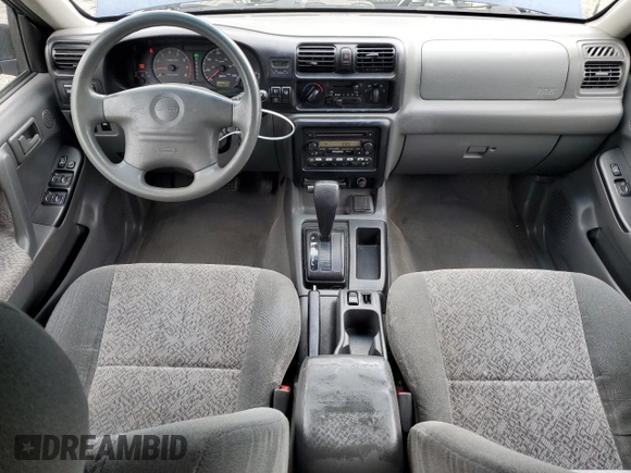 2002 Isuzu Rodeo S with VIN 4S2CK58W124301647, listed as a Copart auction lot 56973895 with 129,009 mi miles and Salvage title. Bid and sale history available at DreamBid. Image 8.