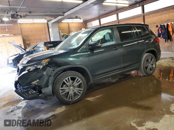 2020 Honda Passport EX-L with VIN 5FNYF8H57LB011549, listed as a Copart auction lot 59123735 with 127,797 mi miles and Salvage title. Bid and sale history available at DreamBid. Image 1.