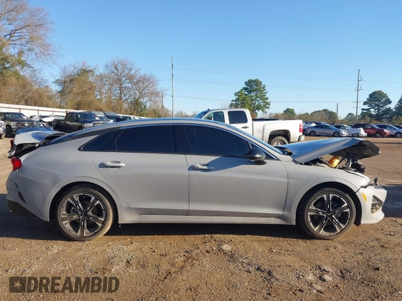 2023 Kia K5 GT-Line z VIN 5XXG64J22PG224836, wystawiony jako IAAI lot #41743997 z przebiegiem 26 633 mil mil oraz . Historia ofert i sprzedaży dostępna na DreamBid. Obrazek 14.