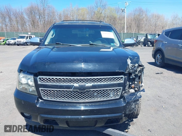 2009 Chevrolet Suburban LTZ with VIN 1GNFK36399J124158, listed as a IAAI auction lot 42063097 with 204,856 mi miles. Bid and sale history available at carsss.com. Image 12.