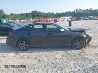 2019 Kia Optima LX with VIN 5XXGT4L36KG297828, listed as a IAAI auction lot 42597545 with 199,652 mi miles and . Bid and sale history available at DreamBid. Image 14.