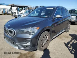 2021 BMW X1 xDrive28i with VIN WBXJG9C05M5S44903, listed as a Copart auction lot 48245275 with 49,897 mi miles and Salvage Title. Bid and sale history available at carsss.com. Image 1.