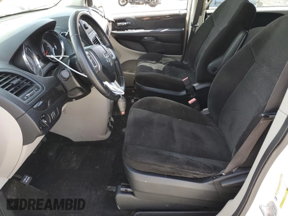2015 Dodge Grand Caravan American Value with VIN 2C4RDGBG0FR607450, listed as a Copart auction lot 48143485 with 77,882 mi miles and Clean Title. Bid and sale history available at DreamBid. Image 7.