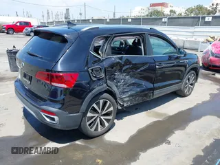 2022 Volkswagen Taos SE z VIN 3VVRX7B2XNM068564, wystawiony jako IAAI lot #42174805 z przebiegiem 26 307 mil mil oraz . Historia ofert i sprzedaży dostępna na DreamBid. Obrazek 4.