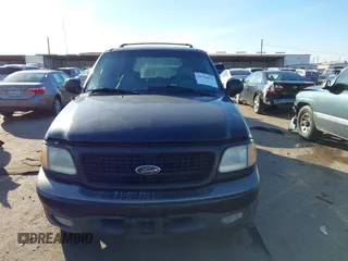 1999 Ford Expedition XLT z VIN 1FMRU1760XLB99695, wystawiony jako IAAI lot #41396676 z przebiegiem 214 434 mil mil oraz . Historia ofert i sprzedaży dostępna na DreamBid. Obrazek 12.
