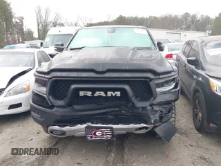 2019 Ram 1500 Rebel with VIN 1C6SRFLTXKN580782, listed as a IAAI auction lot 41498027 with 83,669 mi miles and . Bid and sale history available at DreamBid. Image 6.