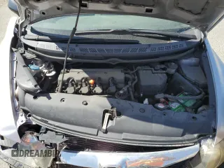 2010 Honda Civic DX-VP z VIN 19XFA1F32AE080022, wystawiony jako Copart lot #57983445 z przebiegiem 154 065 mil mil oraz Szkoda całkowita • Salvage title. Historia ofert i sprzedaży dostępna na DreamBid. Obrazek 11.