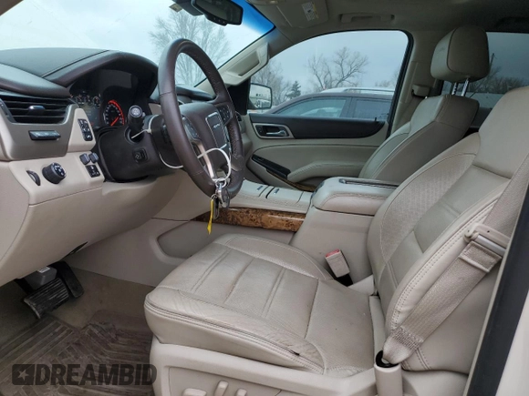 2015 GMC Yukon Denali with VIN 1GKS1CKJ1FR619793, listed as a Copart auction lot 86910314 with 128,559 mi miles and Salvage Title. Bid and sale history available at carsss.com. Image 7.