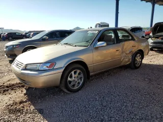 1999 Toyota Camry LE z VIN JT2BF28K9X0235847, wystawiony jako Copart lot #57835225 z przebiegiem 107 400 mil mil oraz Szkoda całkowita • Salvage title. Historia ofert i sprzedaży dostępna na DreamBid. Obrazek 1.