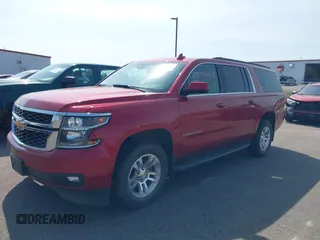 2015 Chevrolet Suburban LT with VIN 1GNSKJKC5FR726299, listed as a IAAI auction lot 42740904 with 96,700 mi miles and . Bid and sale history available at DreamBid. Image 2.