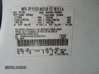 2002 Ford Excursion Special Serv z VIN 1FMNU40L62EB97141, wystawiony jako Copart lot #69656934 z przebiegiem 140 788 mil mil oraz Szkoda całkowita • Salvage title. Historia ofert i sprzedaży dostępna na DreamBid. Obrazek 13.