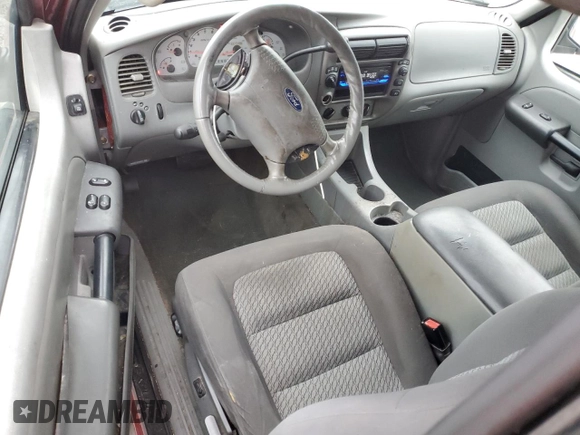 2003 Ford Explorer Sport XLS z VIN 1FMZU70E83UA46944, wystawiony jako Copart lot #86215894 z przebiegiem 127 164 mil mil oraz Szkoda całkowita • Salvage title. Historia ofert i sprzedaży dostępna na DreamBid. Obrazek 8.