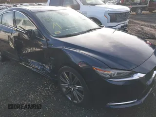 2018 Mazda Mazda6 Grand Touring Reserve with VIN JM1GL1WY9J1321670, listed as a IAAI auction lot 41401543 with 33,679 mi miles. Bid and sale history available at carsss.com. Image 6.