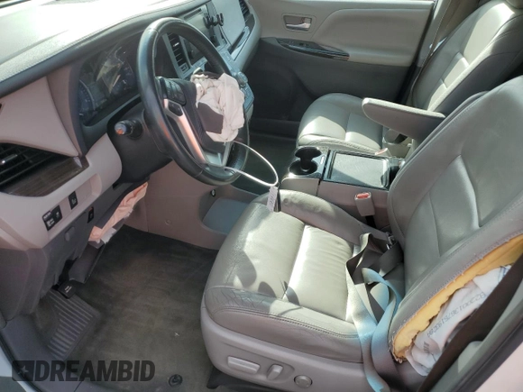 2017 Toyota Sienna XLE Auto Access Seat с VIN 5TDYZ3DC2HS832821, выставлен на аукционе Copart как лот 77212974 с пробегом 128 407 миль миль и Списание • Salvage title. История ставок и продаж доступна на DreamBid. Изображение 7.