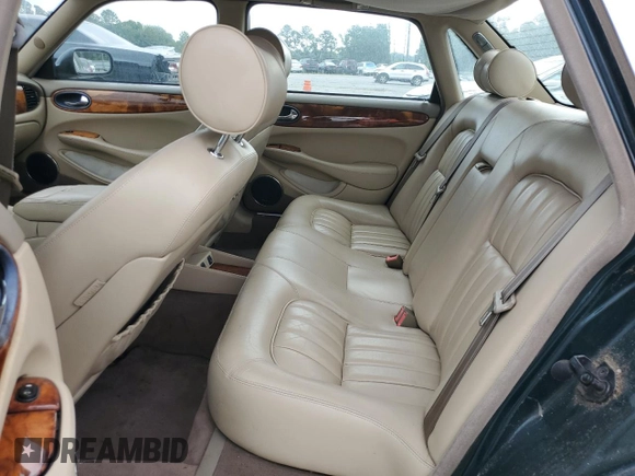 1999 Jaguar XJ with VIN SAJHX1044XC865054, listed as a Copart auction lot 57825325 with 71,145 mi miles and Clean title. Bid and sale history available at DreamBid. Image 10.