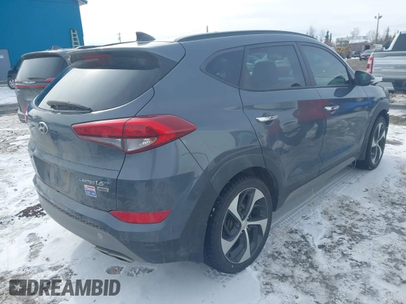2017 Hyundai Tucson Limited with VIN KM8J3CA27HU307808, listed as a IAAI auction lot 41980342 with 91,669 mi miles. Bid and sale history available at carsss.com. Image 4.