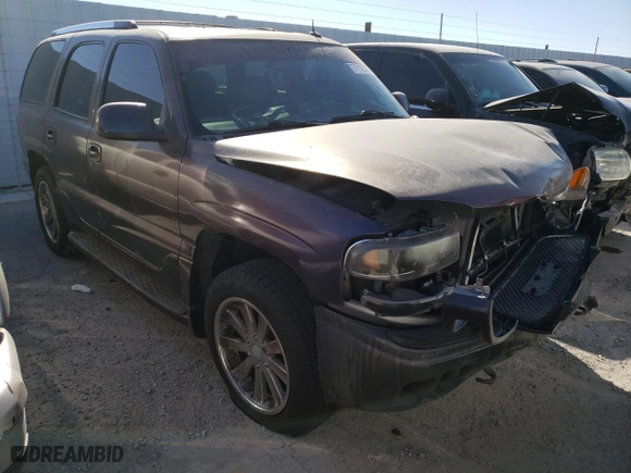 2002 GMC Yukon Denali with VIN 1GKEK63U62J340241, listed as a Copart auction lot 71122174 with 259,297 mi miles and Salvage Title. Bid and sale history available at carsss.com. Image 4.