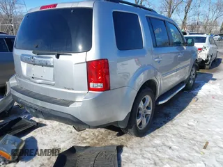 2014 Honda Pilot EX-L with VIN 5FNYF3H78EB006464, listed as a IAAI auction lot 41321137 with 198,496 mi miles and . Bid and sale history available at DreamBid. Image 4.