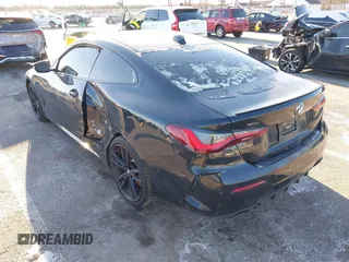 2021 BMW 4 Series M440i xDrive with VIN WBA13AR0XMCF50380, listed as a IAAI auction lot 41200404 with 26,102 mi miles and . Bid and sale history available at DreamBid. Image 3.