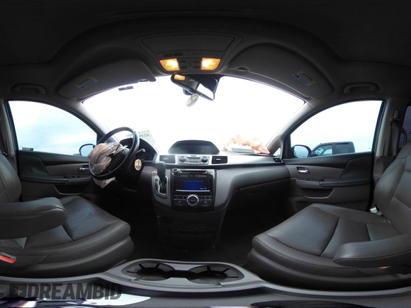 2015 Honda Odyssey Touring Elite with VIN 5FNRL5H97FB124565, listed as a IAAI auction lot 42358412 with 206,444 mi miles and . Bid and sale history available at DreamBid. Image 19.