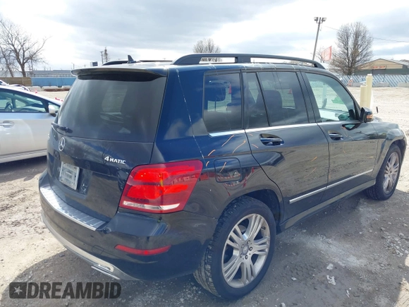 2015 Mercedes-Benz GLK with VIN WDCGG8JB0FG402300, listed as a IAAI auction lot 41969142 with 135,806 mi miles. Bid and sale history available at carsss.com. Image 4.