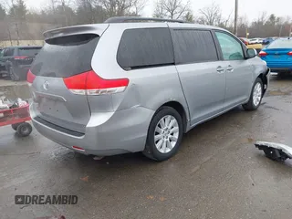 2012 Toyota Sienna LE with VIN 5TDJK3DCXCS040253, listed as a IAAI auction lot 41957623 with 164,780 mi miles. Bid and sale history available at carsss.com. Image 4.