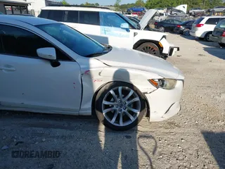 2014 Mazda Mazda6 i Touring with VIN JM1GJ1V65E1117072, listed as a IAAI auction lot 42060743 with 181,524 mi miles. Bid and sale history available at carsss.com. Image 6.