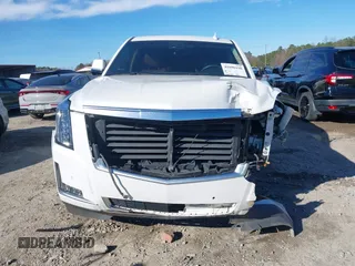 2017 Cadillac Escalade Luxury z VIN 1GYS3BKJ0HR184679, wystawiony jako IAAI lot #41690198 z przebiegiem 116 512 mil mil oraz . Historia ofert i sprzedaży dostępna na DreamBid. Obrazek 13.