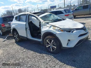 2017 Toyota RAV4 XLE with VIN JTMRFREV7HJ716723, listed as a IAAI auction lot 41672427 with 1 mi miles. Bid and sale history available at carsss.com. Image 1.