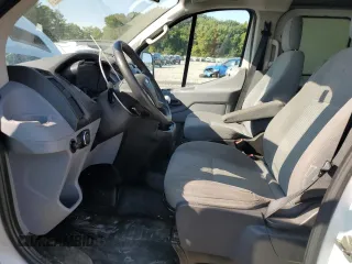 2016 Ford Transit Cargo with VIN 1FTYR1ZM5GKB42881, listed as a Copart auction lot 70193724 with 140,928 mi miles and Salvage Title. Bid and sale history available at DreamBid. Image 7.