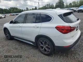 2018 BMW X1 xDrive28i with VIN WBXHT3C35J5L29298, listed as a Copart auction lot 59041435 with 27,612 mi miles and Salvage title. Bid and sale history available at DreamBid. Image 2.