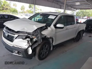 2020 Honda Ridgeline RTL-E with VIN 5FPYK3F71LB005028, listed as a IAAI auction lot 42167883 with 81,882 mi miles and . Bid and sale history available at DreamBid. Image 17.