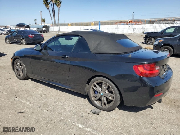 2015 BMW 2 Series M235i with VIN WBA1M1C56FV393730, listed as a Copart auction lot 45348734 with 59,231 mi miles and Salvage Title. Bid and sale history available at carsss.com. Image 2.