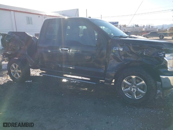 2018 Ford F-150 XL with VIN 1FTFX1E54JFB12847, listed as a IAAI auction lot 41733325 with 162,546 mi miles. Bid and sale history available at carsss.com. Image 6.